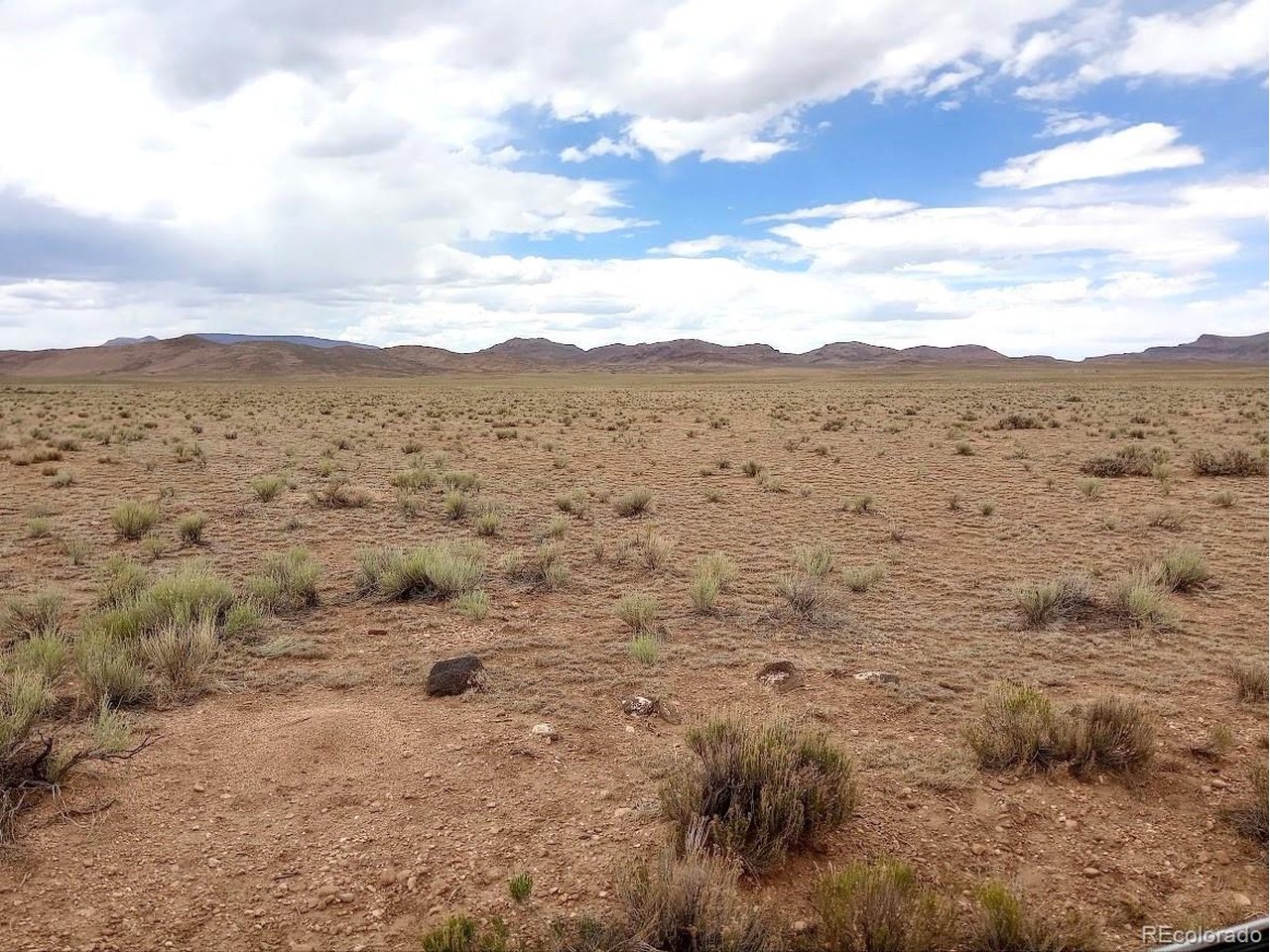 40 County Road Sanford, CO 81151 - Photo 2 of 19 Large volcanic rock is the approx coener of property