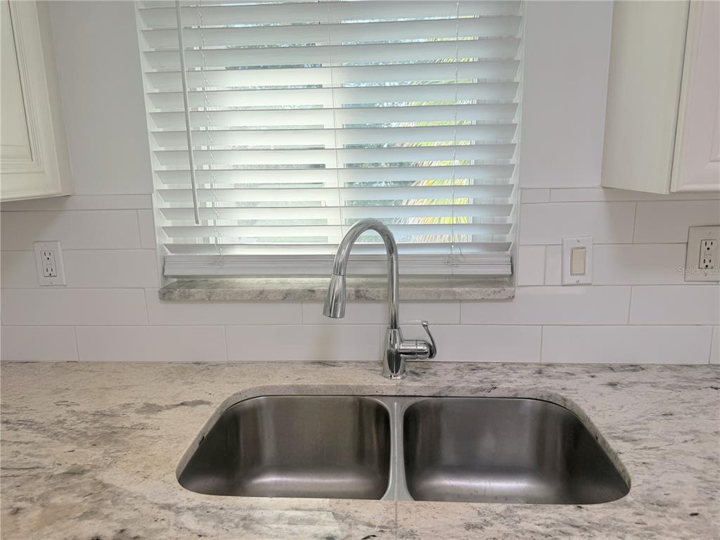 1524 Lakeview Road, Unit 305 Clearwater, FL 33756 - Photo 4 of 18 a close view of sink and tap