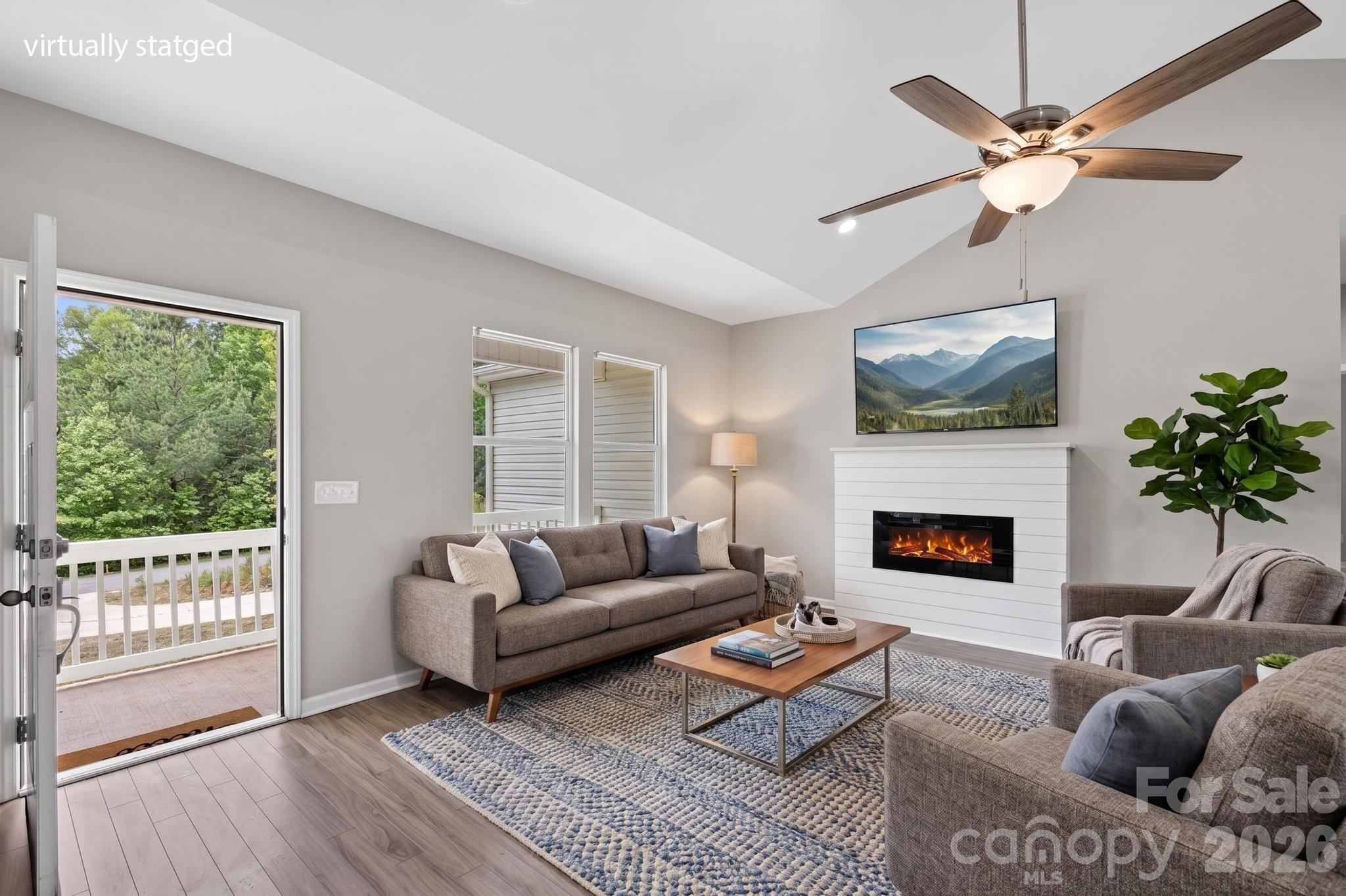 2119 South Road Morganton, NC 28655 - Photo 14 of 47 a living room with furniture and a fireplace