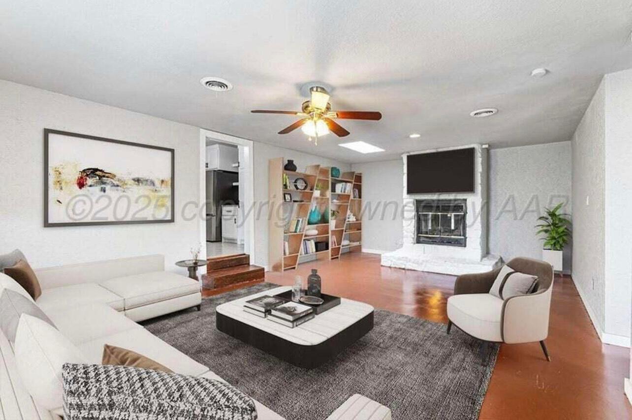 2905 South Roosevelt Street Amarillo, TX 79103 - Photo 8 of 21 a living room with furniture potted plant and window