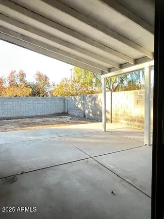 a house view with a backyard space