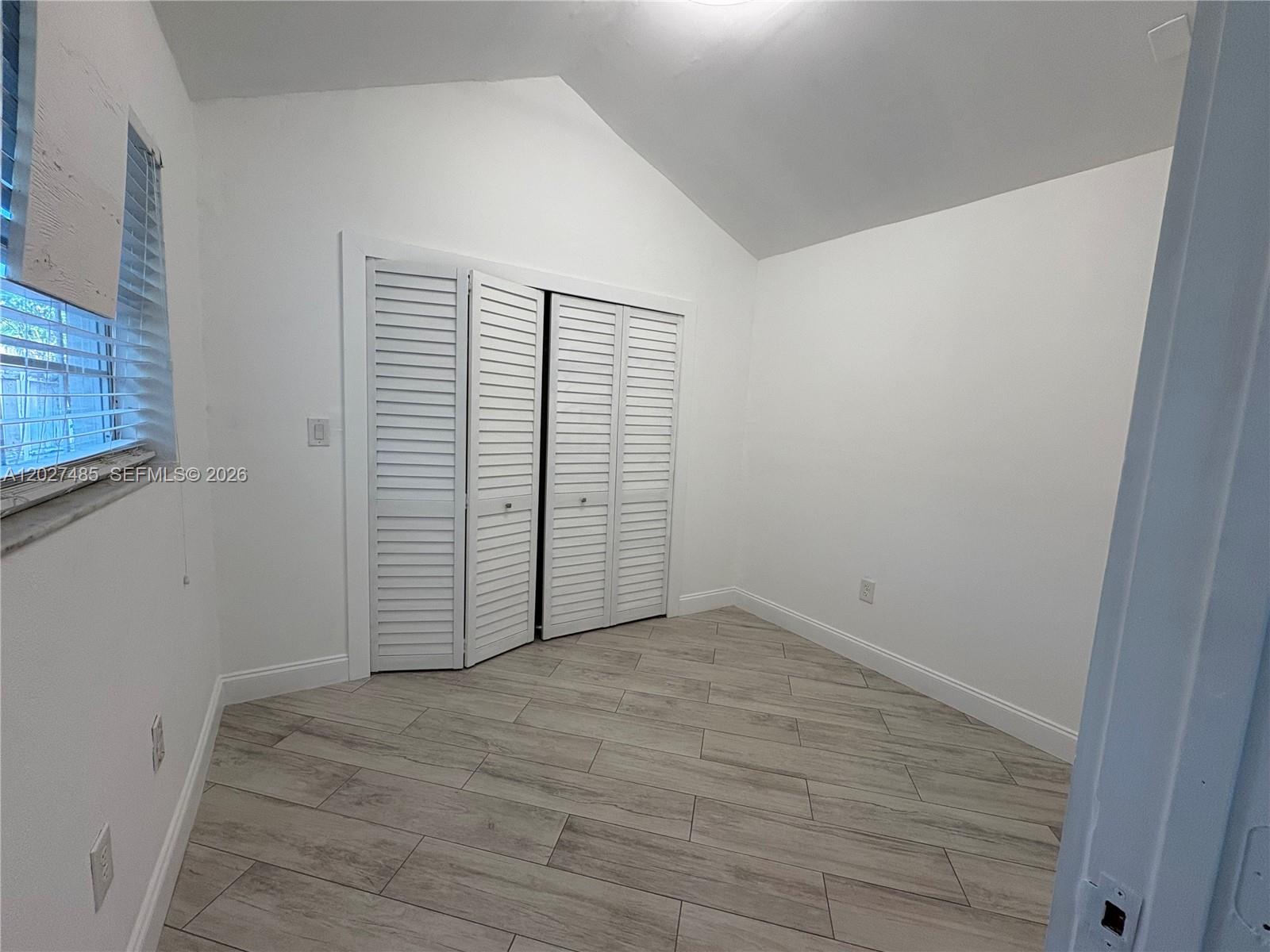 6753 Southwest 39th Terrace, Unit REAR Miami, FL 33155 - Photo 6 of 9 Bedroom w closet