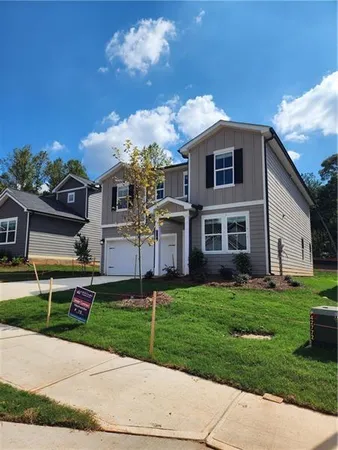 a front view of house with yard