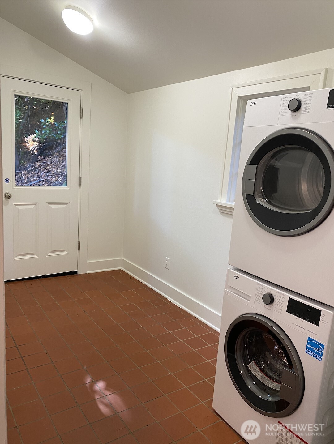 2611 3rd Avenue West Seattle, WA 98119 - Photo 13 of 13 a utility room with dryer and washer