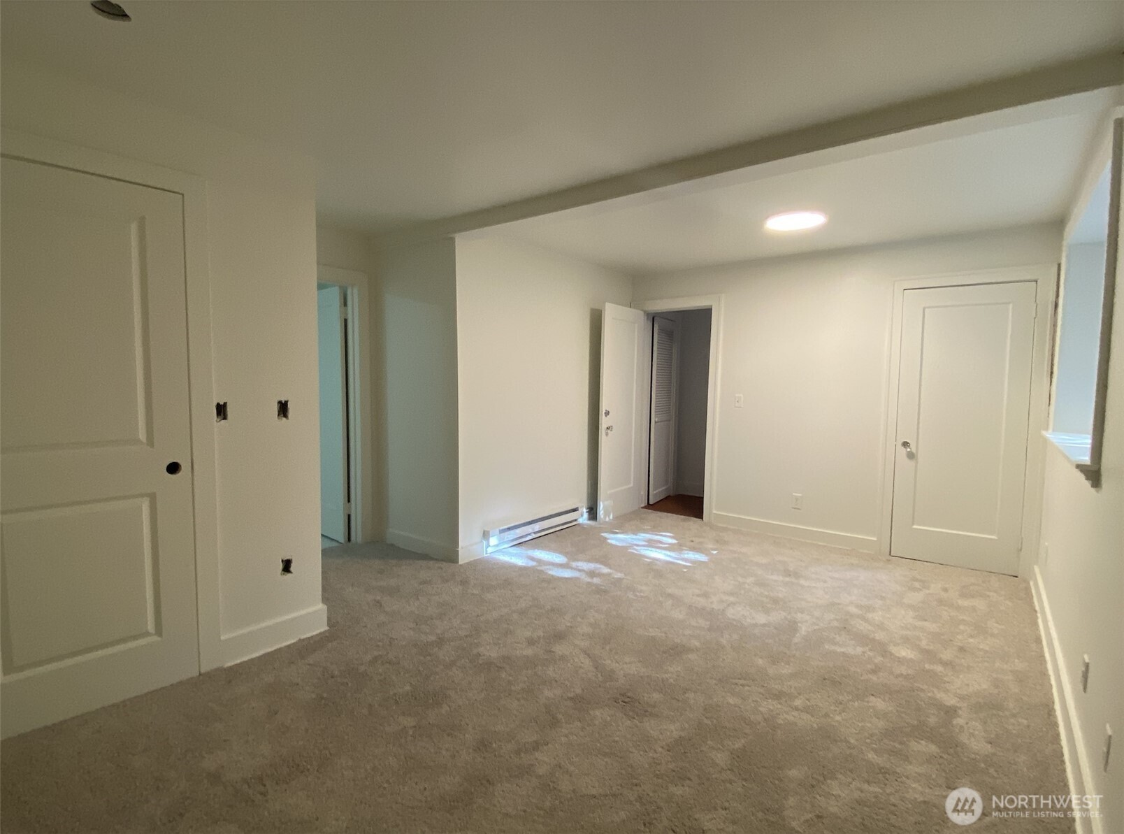 2611 3rd Avenue West Seattle, WA 98119 - Photo 7 of 13 a view of an empty room and closet area