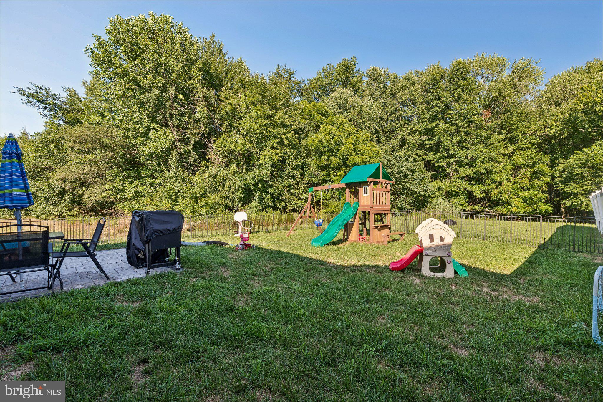 174 Skeet Road Medford, NJ 08055 - Photo 34 of 38 Spacious yard with playset and greenery.