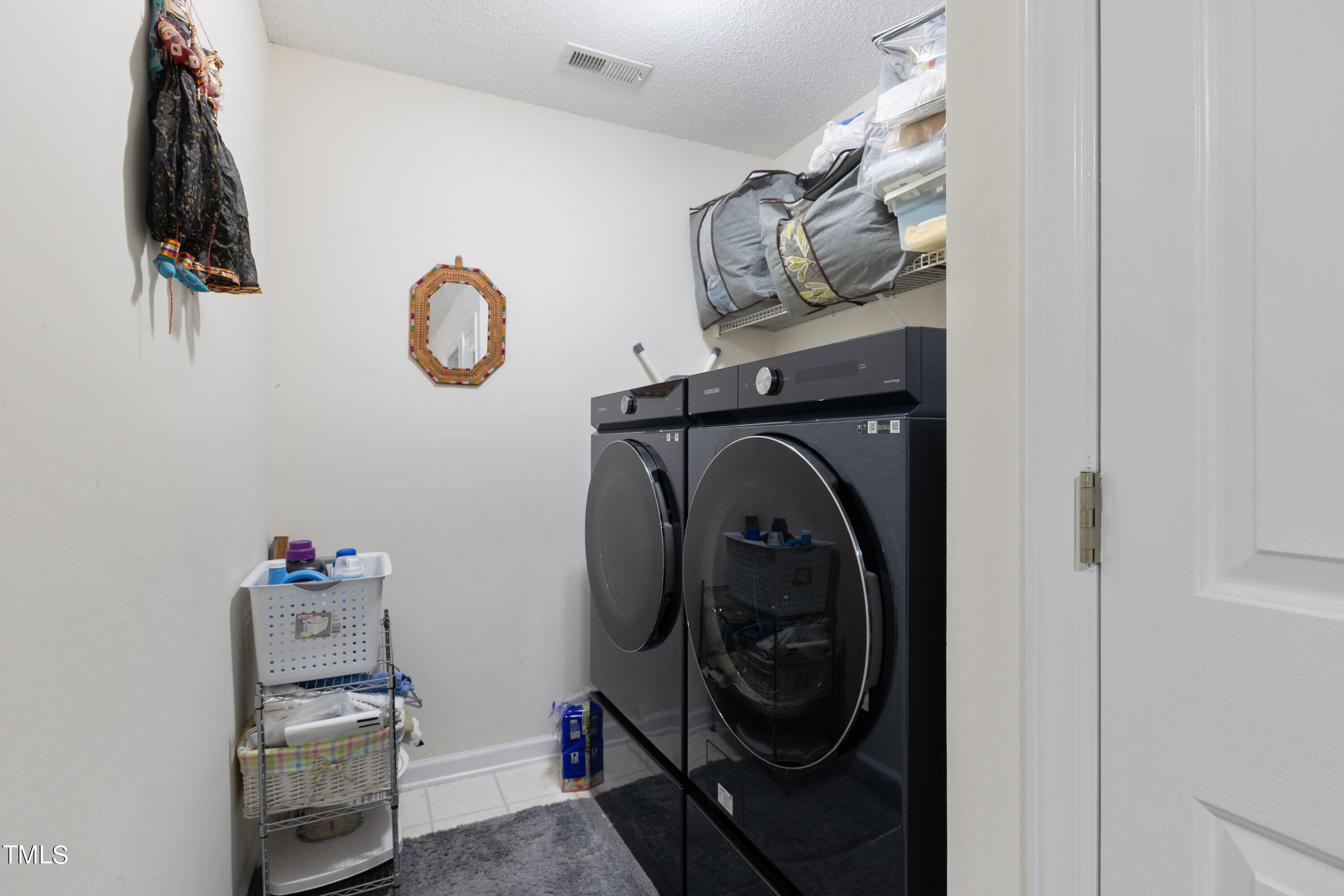 3 Weeping Beech Way Durham, NC 27713 - Photo 20 of 26 a utility room with dryer and washer