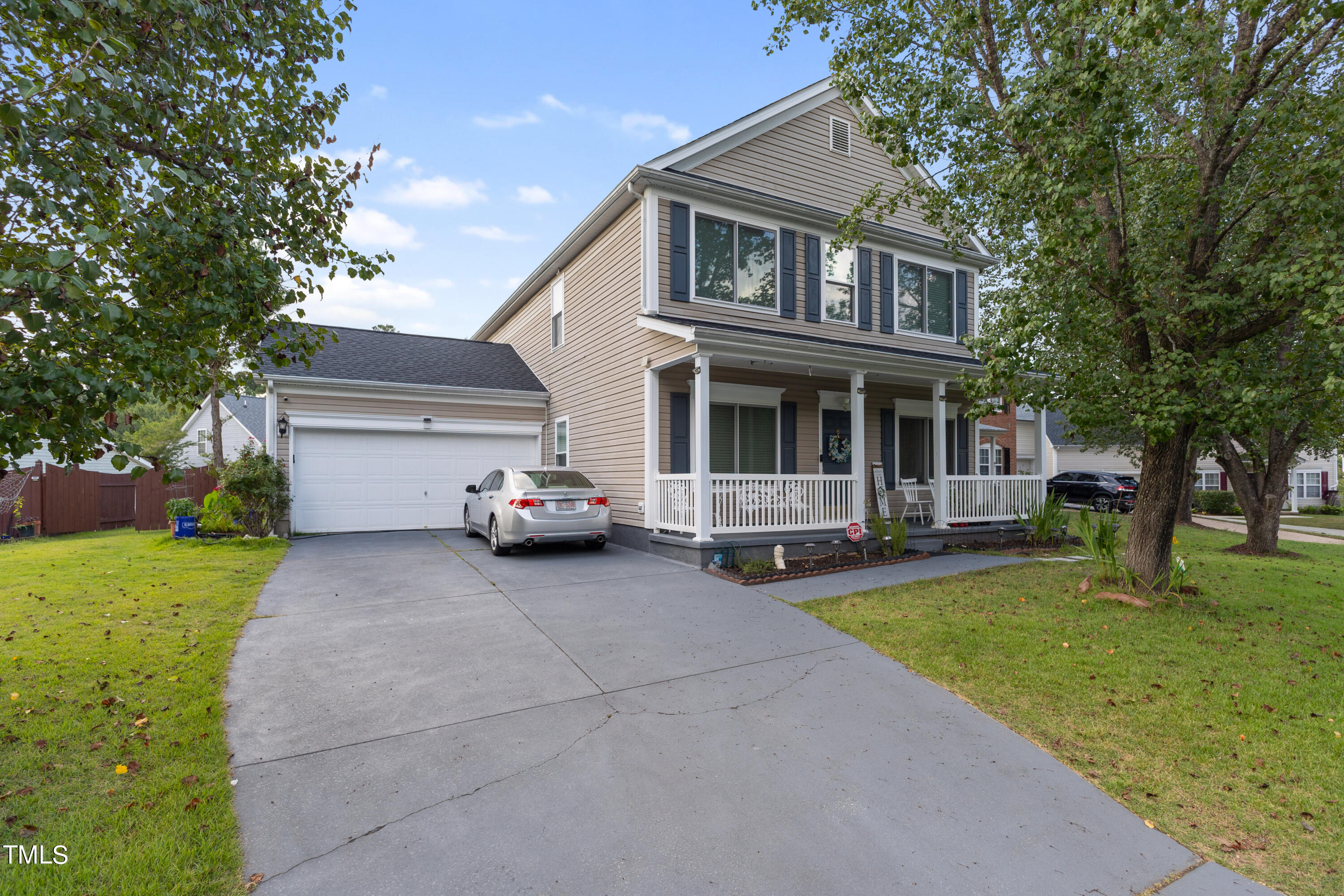 3 Weeping Beech Way Durham, NC 27713 - Photo 2 of 26 a view of a house with a yard and large tree