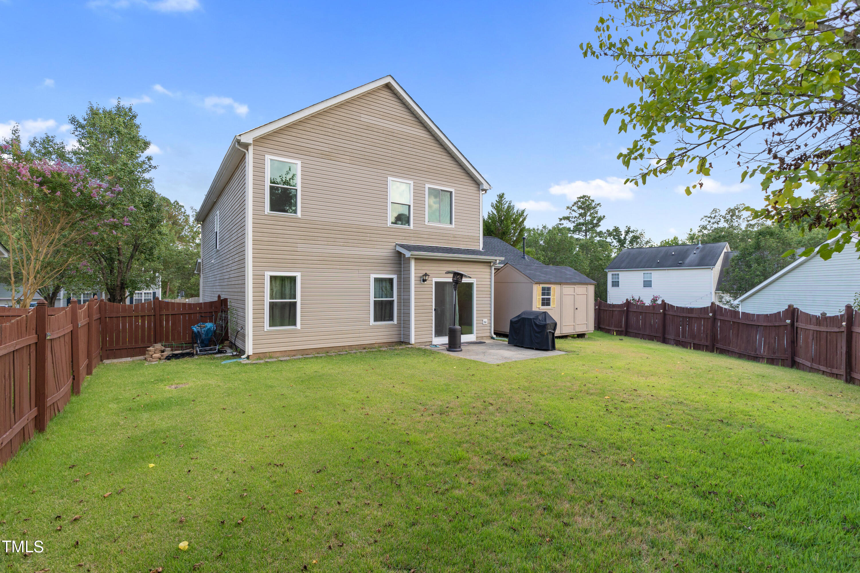 3 Weeping Beech Way Durham, NC 27713 - Photo 24 of 26 a view of a house with a yard and a tree