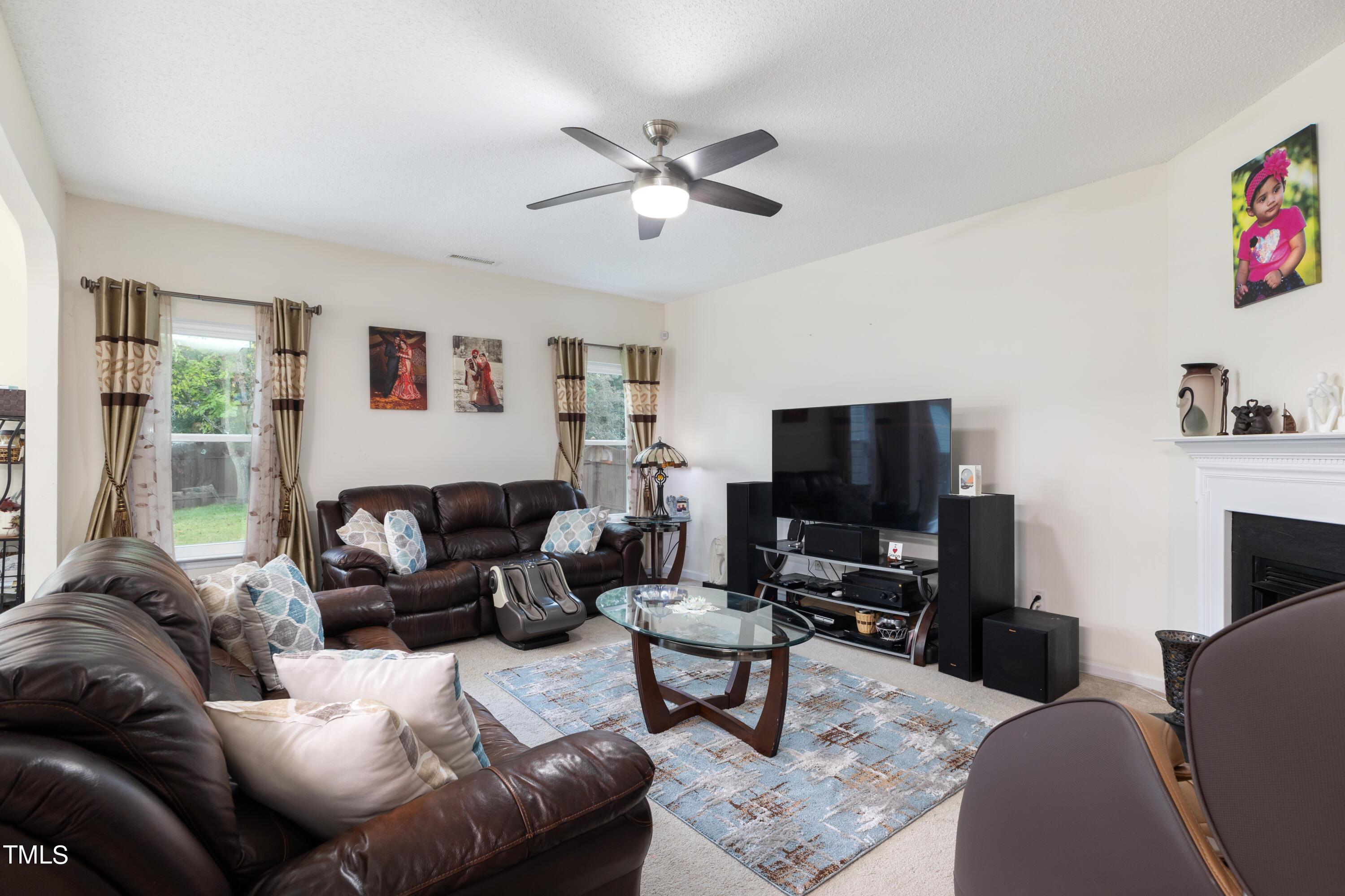 3 Weeping Beech Way Durham, NC 27713 - Photo 8 of 26 a living room with furniture and a flat screen tv