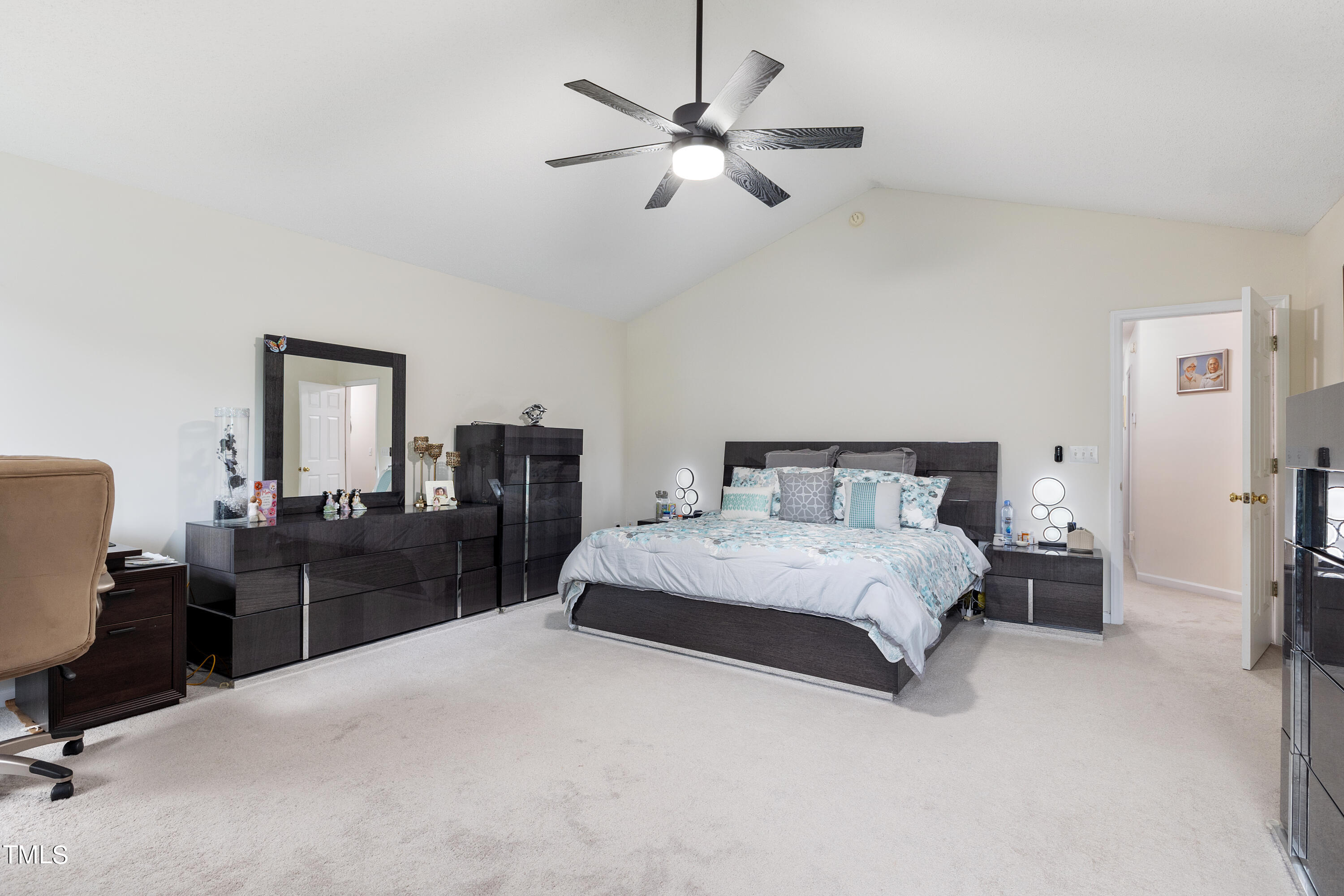 3 Weeping Beech Way Durham, NC 27713 - Photo 10 of 26 a bedroom with a bed and furniture