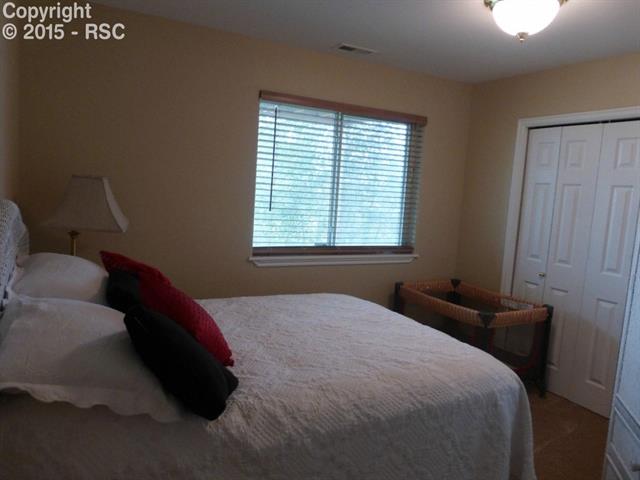 18170 Bar X Road Colorado Springs, CO 80908 - Photo 20 of 25 one of two bedrooms in the walkout level