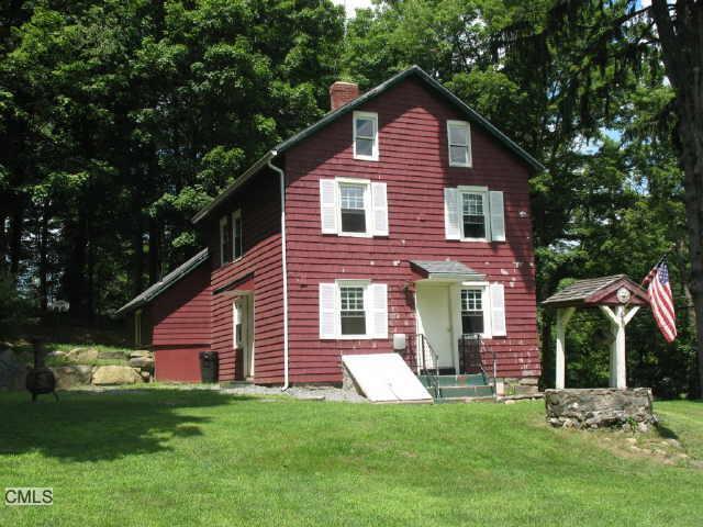 141 Chestnut Ridge Road Bethel, CT 06801 - Photo 1 of 1 a view of a house with a yard