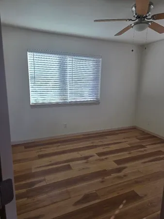 a view of a room that has a window in it