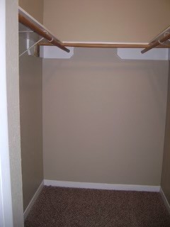 151-201 Springlake Drive Dripping Springs, TX 78620 - Photo 8 of 12 a view of a room with shelf on the wall