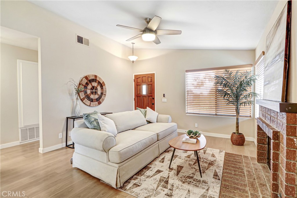 9849 Allesandro Court Rancho Cucamonga, CA 91730 - Photo 7 of 20 a living room with furniture and a large window