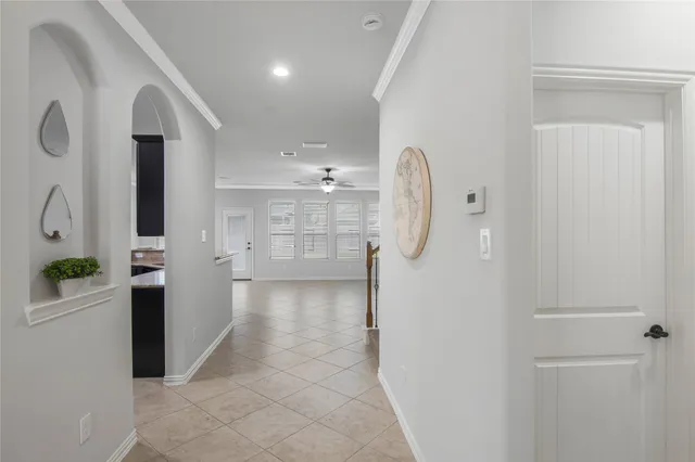 a view of a bathroom with a shower and mirror