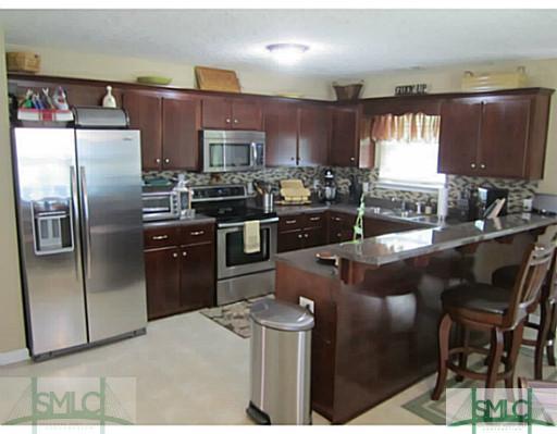 108 Becca Drive Springfield, GA 31329 - Photo 12 of 24 Kitchen. Comes with all Stainless Steel Appliances