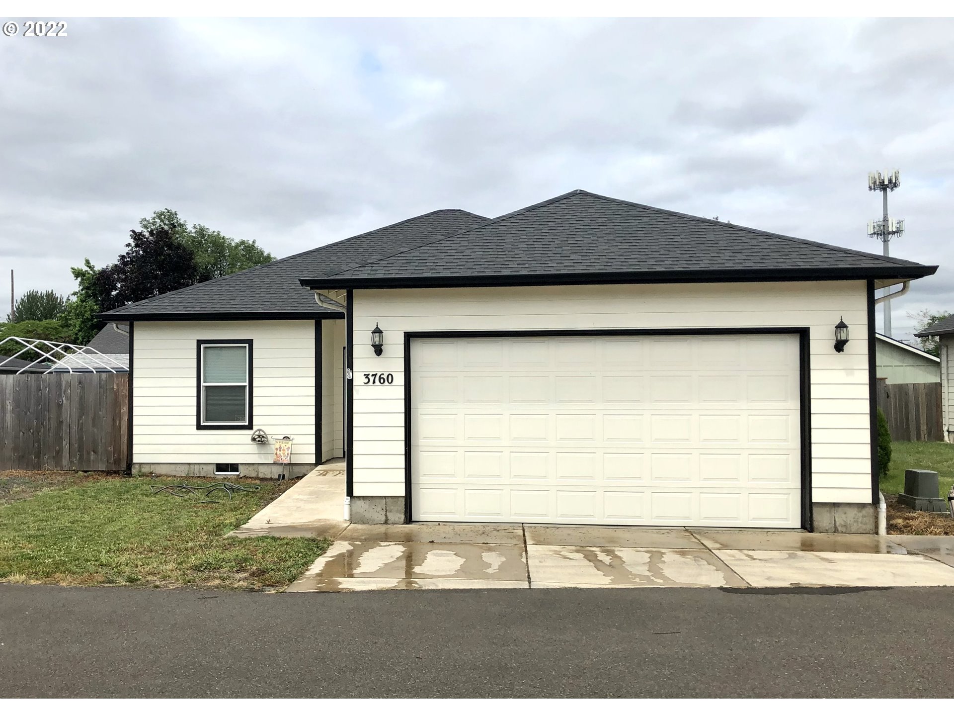 3760 E Street Springfield, OR 97478 - Photo 1 of 24 a view of a house with a yard