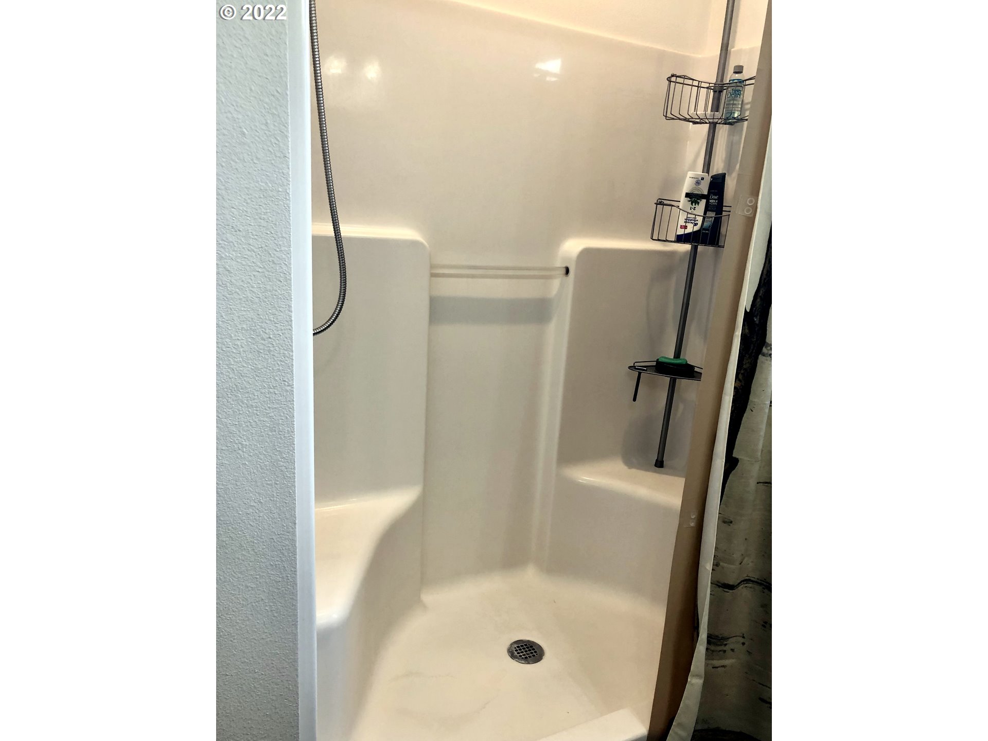 3760 E Street Springfield, OR 97478 - Photo 11 of 24 a bathroom with a glass shower door