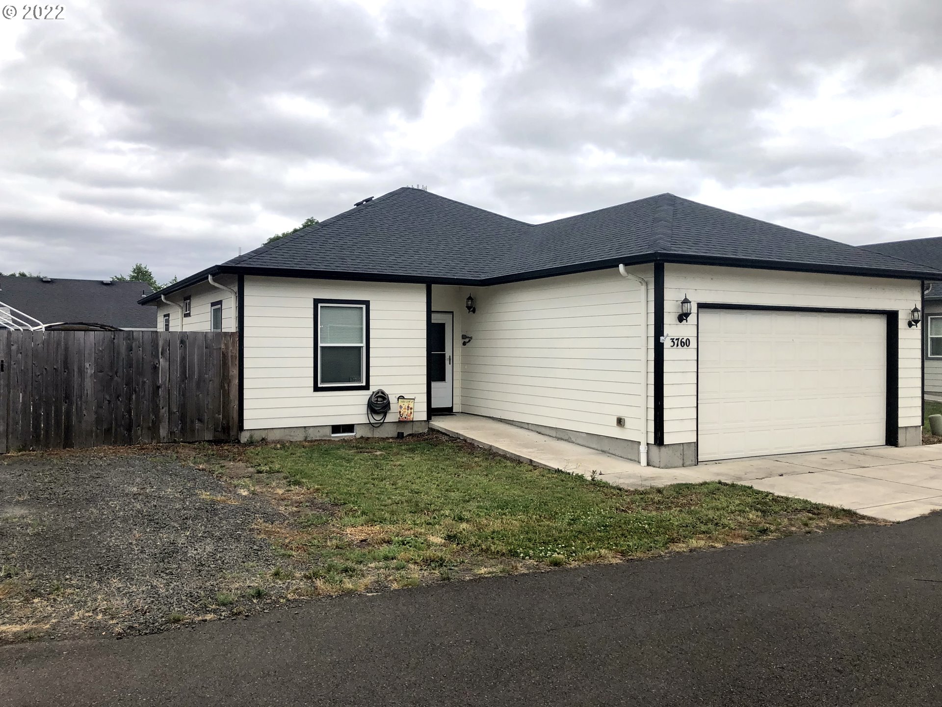 3760 E Street Springfield, OR 97478 - Photo 2 of 24 a house with yard in front of it