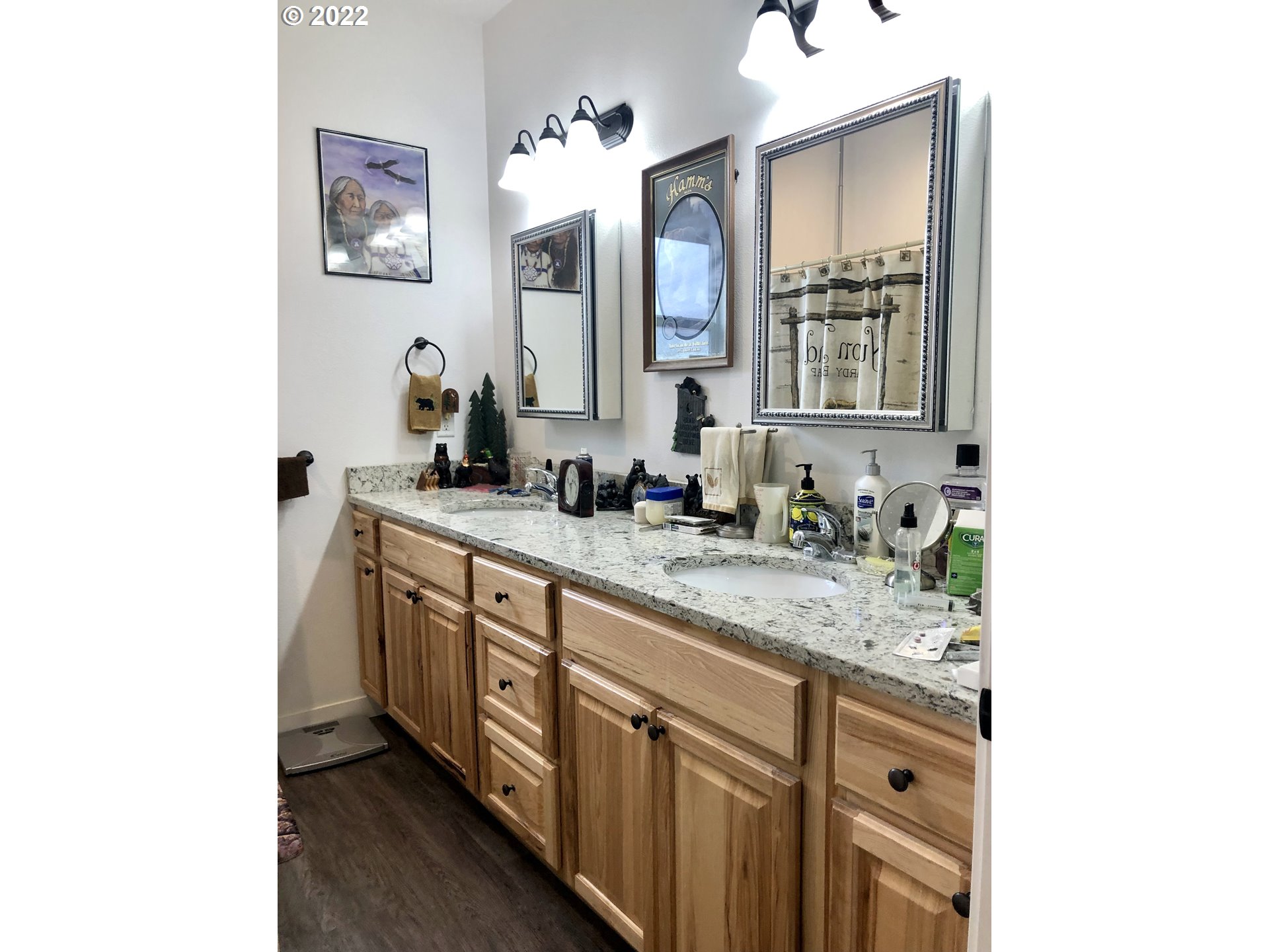 3760 E Street Springfield, OR 97478 - Photo 10 of 24 a bathroom with a double vanity sink and a mirror