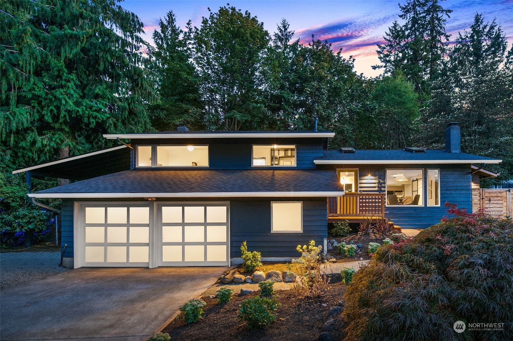 14255 147th Place Southeast Renton, WA 98059 - Photo 1 of 31 a front view of a house with a yard