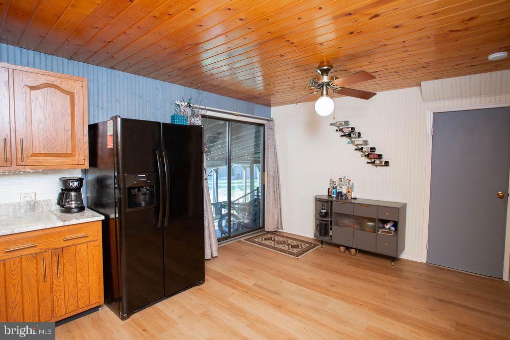 622 Spruce Avenue Pitman, NJ 08071 - Photo 11 of 47 a kitchen with stainless steel appliances granite countertop a refrigerator and a stove top oven