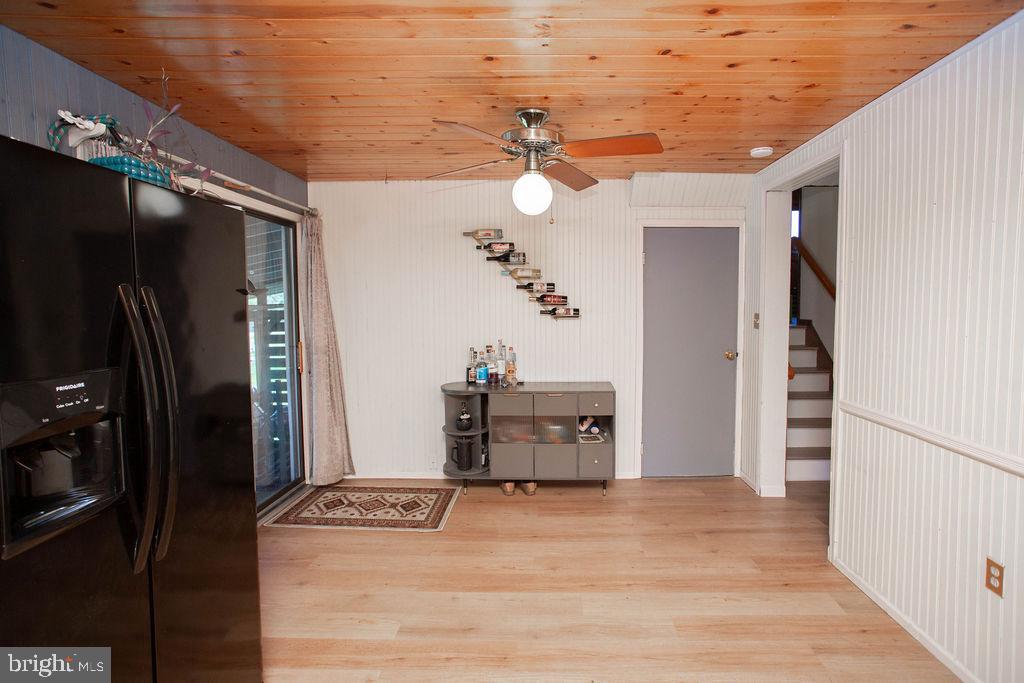 622 Spruce Avenue Pitman, NJ 08071 - Photo 12 of 47 a bedroom with a bed and a chandelier