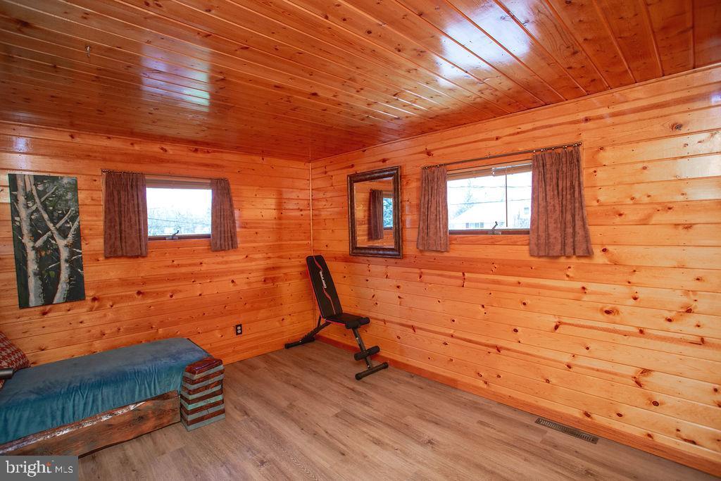622 Spruce Avenue Pitman, NJ 08071 - Photo 16 of 47 a view of a room with wooden floor and windows