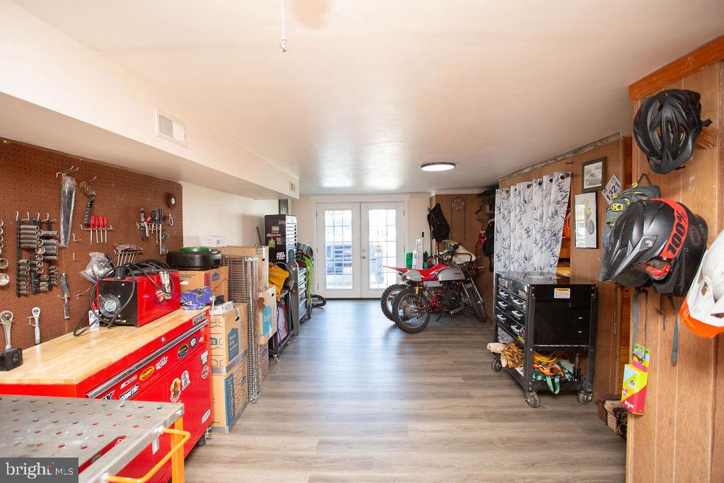 622 Spruce Avenue Pitman, NJ 08071 - Photo 33 of 47 a living room with lots of gym equipment