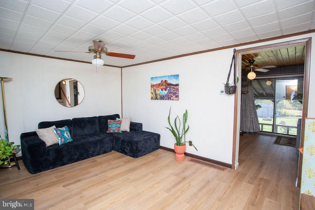 622 Spruce Avenue Pitman, NJ 08071 - Photo 5 of 47 a living room with furniture and wooden floor