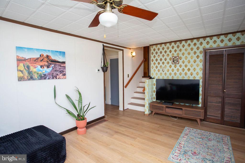 622 Spruce Avenue Pitman, NJ 08071 - Photo 6 of 47 a living room with furniture and a flat screen tv
