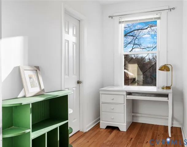a bathroom with a bathtub a sink a vanity and a shower