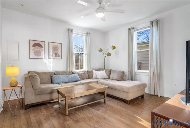 a kitchen with stainless steel appliances granite countertop a sink stove and microwave