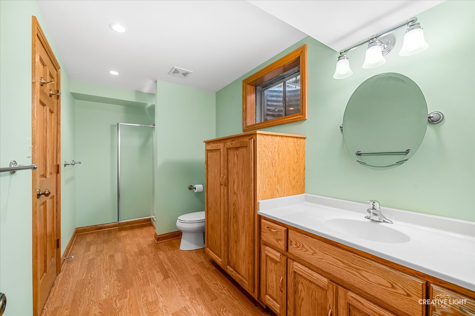 714 East Knights Road Sandwich, IL 60548 - Photo 23 of 33 a spacious bathroom with a double vanity sink toilet and shower