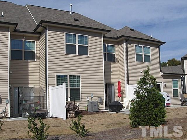 7641 Weathered Oak Way Raleigh, NC 27616 - Photo 2 of 20 a front view of a house with a yard