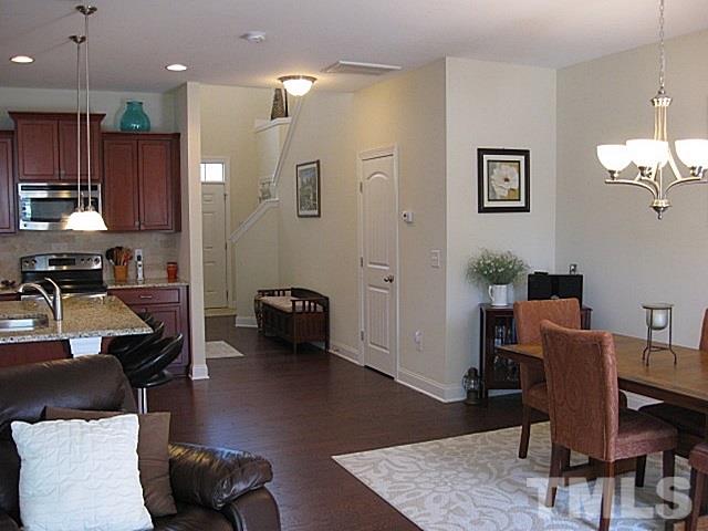 7641 Weathered Oak Way Raleigh, NC 27616 - Photo 5 of 20 a workspace with furniture and wooden floor