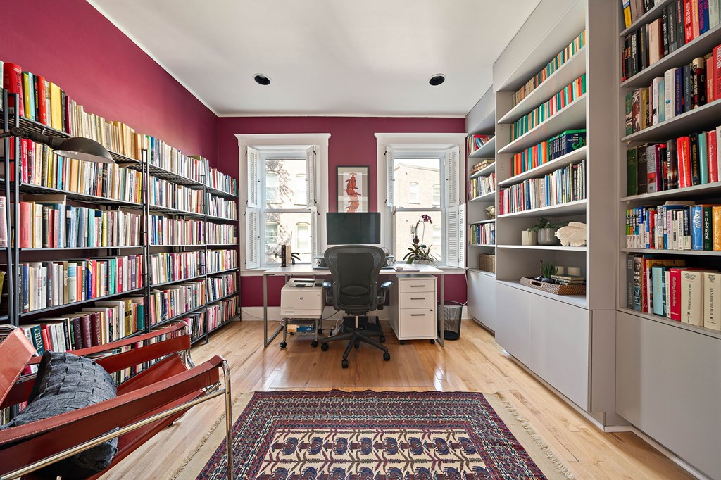 23 Claflin Road, Unit 1 Brookline, MA 02445 - Photo 16 of 41 a living room with furniture and a book shelf