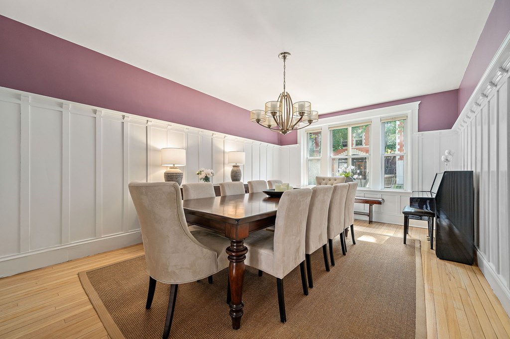 23 Claflin Road, Unit 1 Brookline, MA 02445 - Photo 7 of 41 a view of a dining room with furniture window and wooden floor