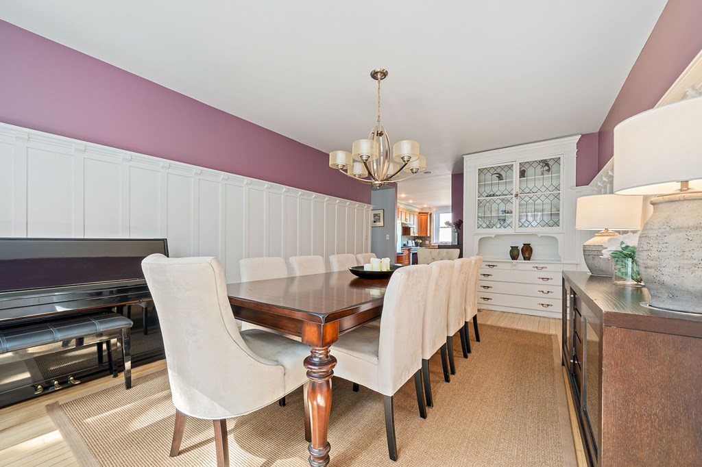 23 Claflin Road, Unit 1 Brookline, MA 02445 - Photo 8 of 41 a view of a dining room with furniture