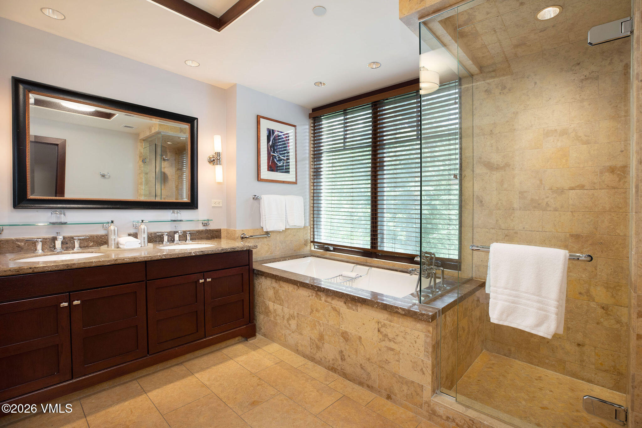 1 Vail Road, Unit 5102J Vail, CO 81657 - Photo 8 of 26 a bathroom with a granite countertop sink and a bathtub