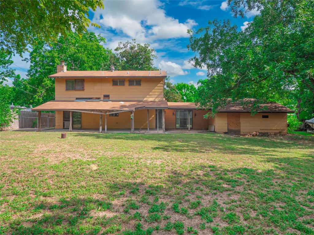 401 Ramble Lane Austin, TX 78745 - Photo 26 of 32 a front view of a house with a yard