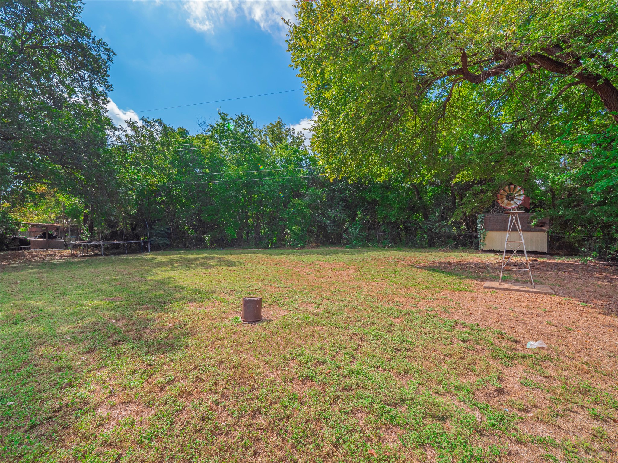 401 Ramble Lane Austin, TX 78745 - Photo 28 of 32 a view of a swimming pool with a yard