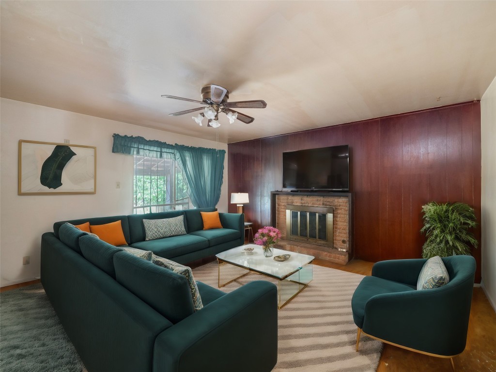 401 Ramble Lane Austin, TX 78745 - Photo 3 of 32 a living room with furniture and a flat screen tv