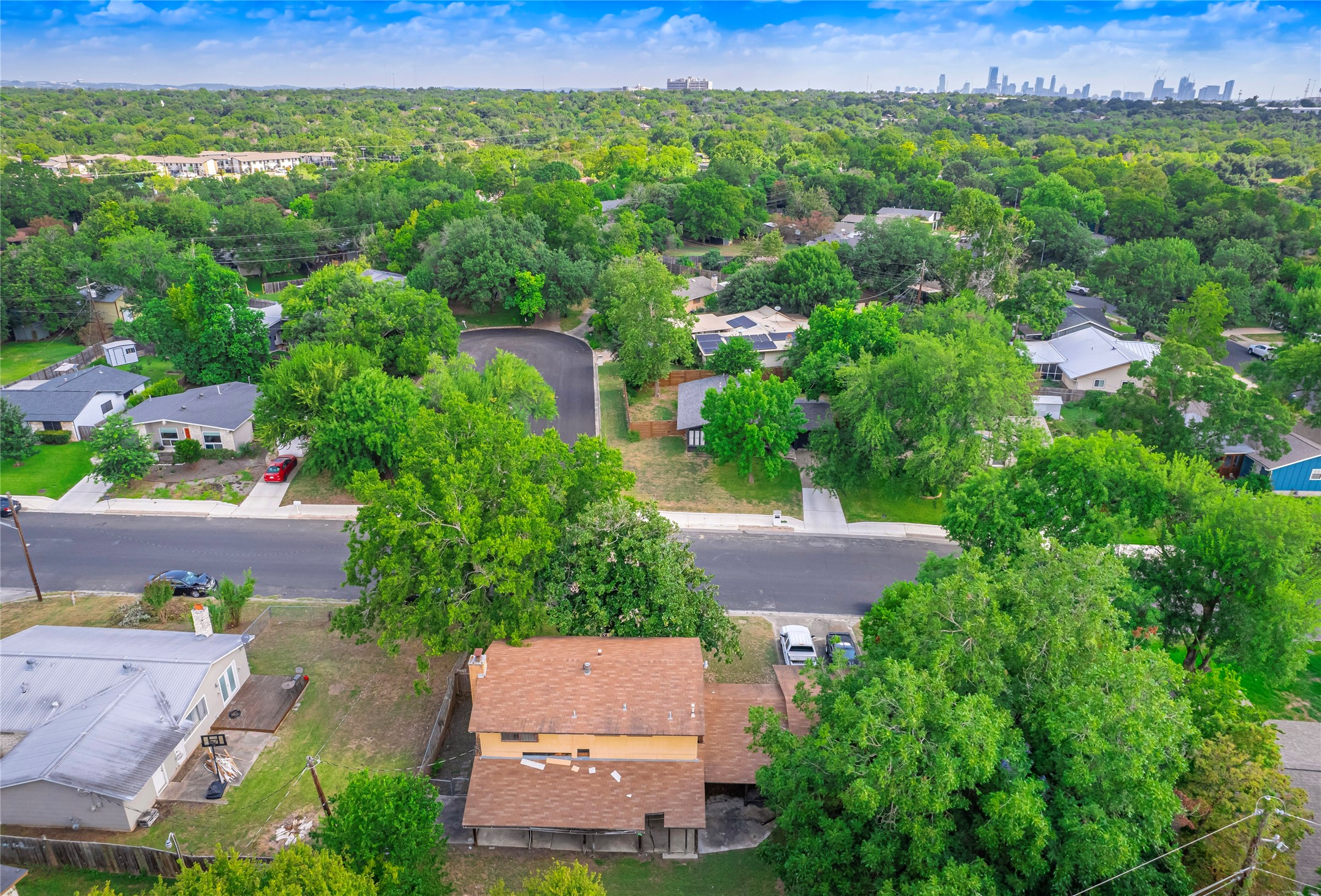 401 Ramble Lane Austin, TX 78745 - Photo 32 of 32 an aerial view of a house with a yard