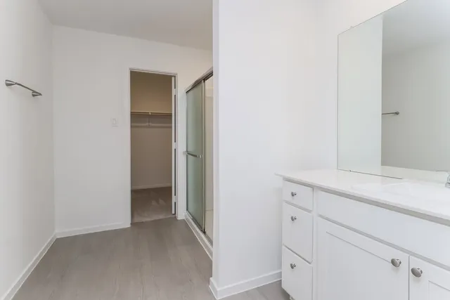 a view of storage and utility room with closet