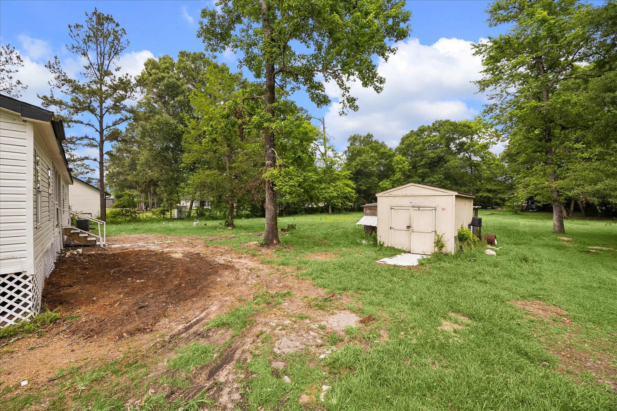 14891 Jim Stowe Road Conroe, TX 77302 - Photo 20 of 23 Backyard
