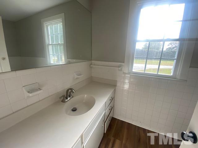 164 Jernigan Road Dunn, NC 28334 - Photo 22 of 30 a bathroom with a sink and a window