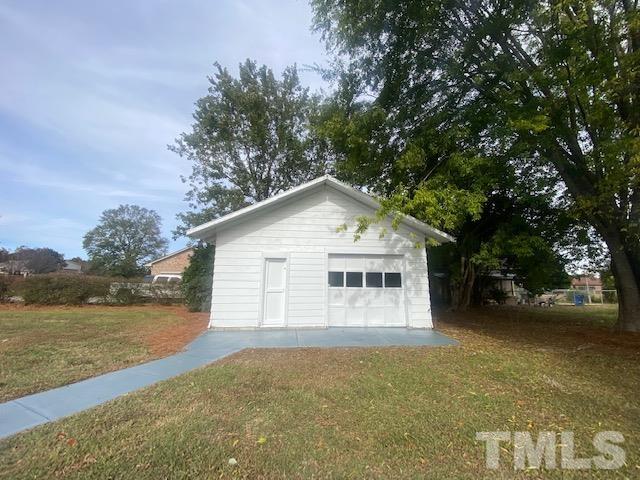164 Jernigan Road Dunn, NC 28334 - Photo 5 of 30 a view of a house with a yard and lake view